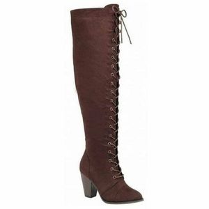 Brown thigh length lace up boots